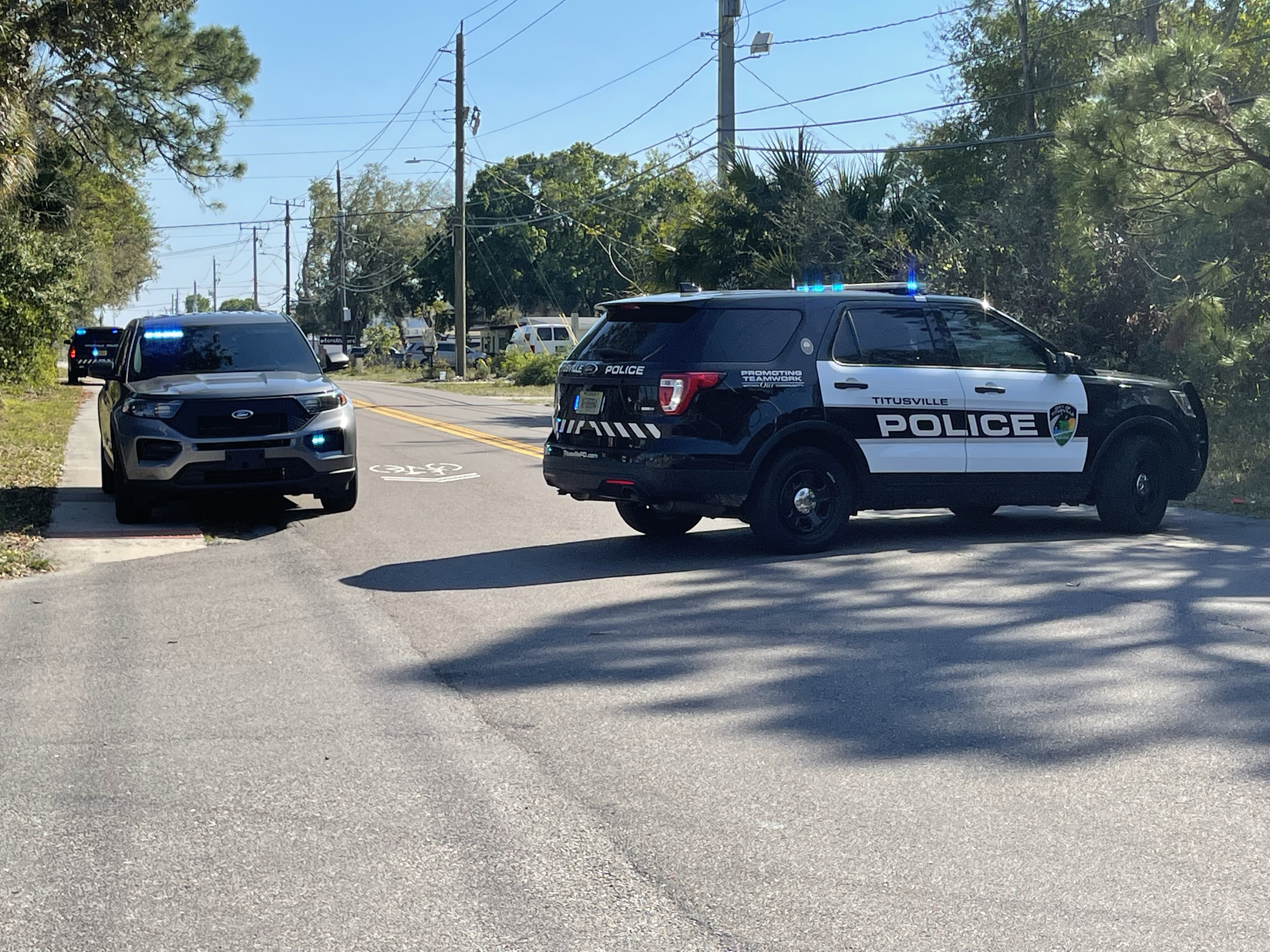 Detectives Investigating Drive-By Shooting