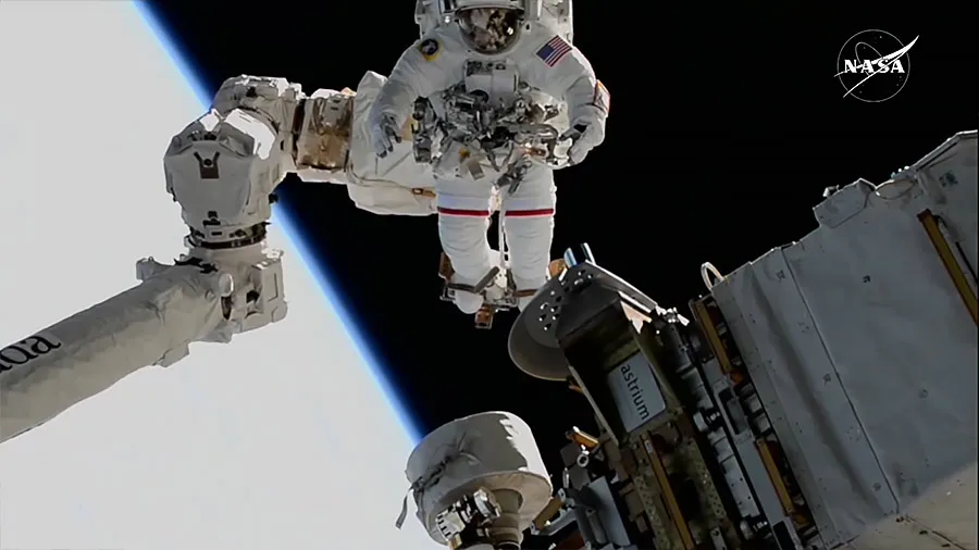 ‘Stuck’ Astronauts Take Spacewalk Together, Set New Record